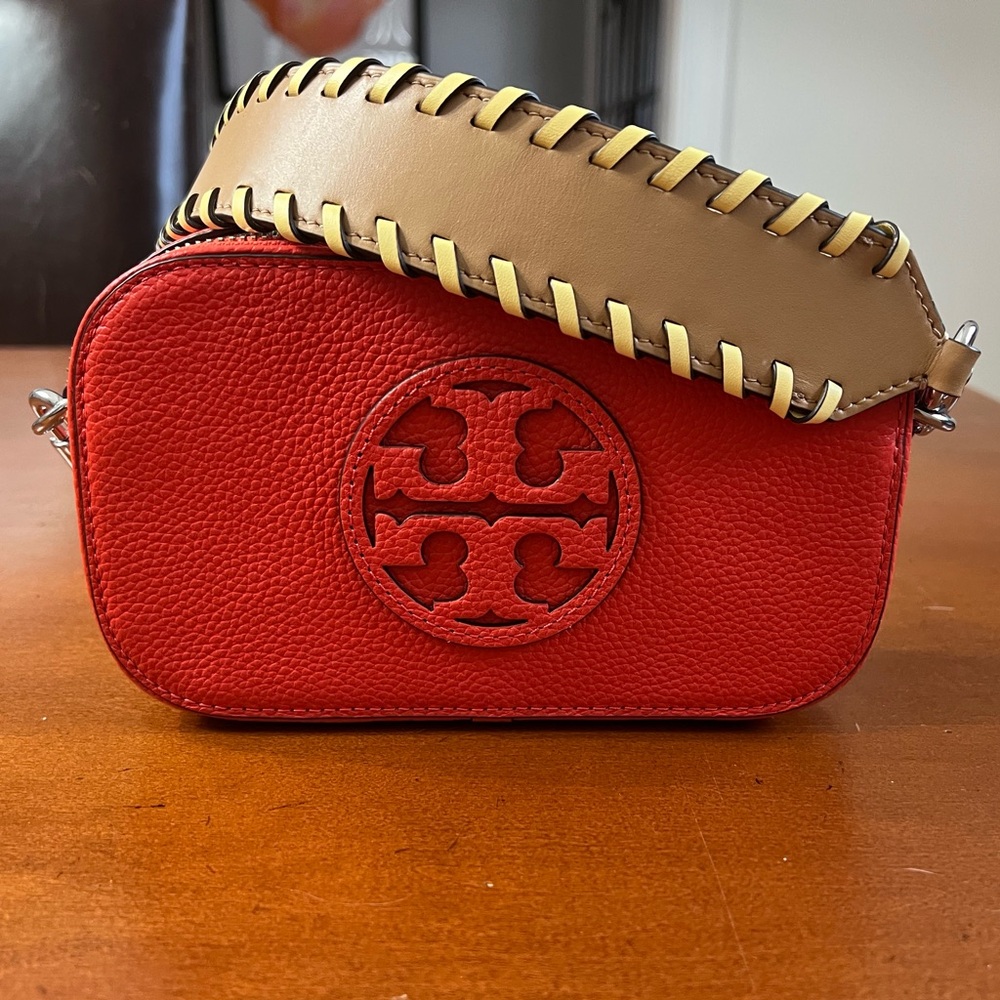 Tory Burch “Mini Miller crossbody Bag”. 
Two straps